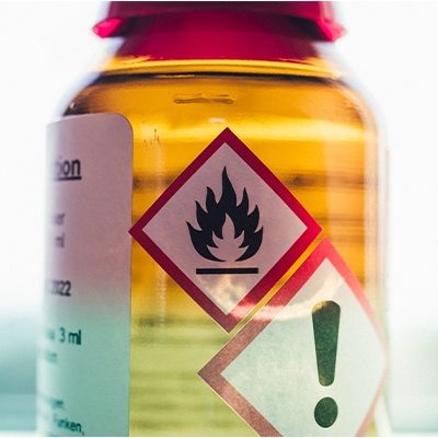Chemical jar with safety labels